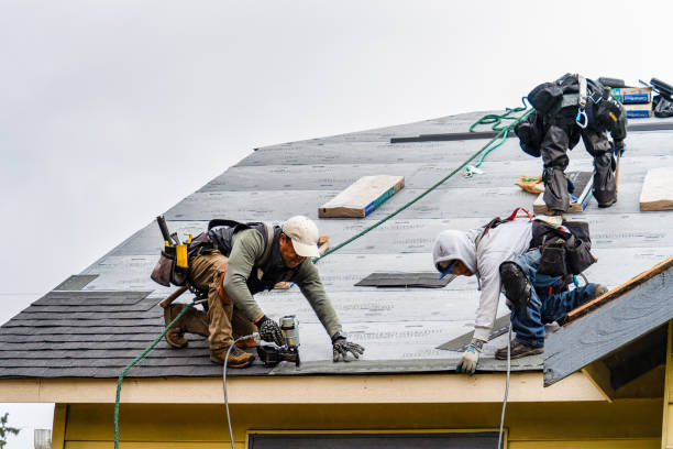 Professional Roofing technician working in Center Point, IA